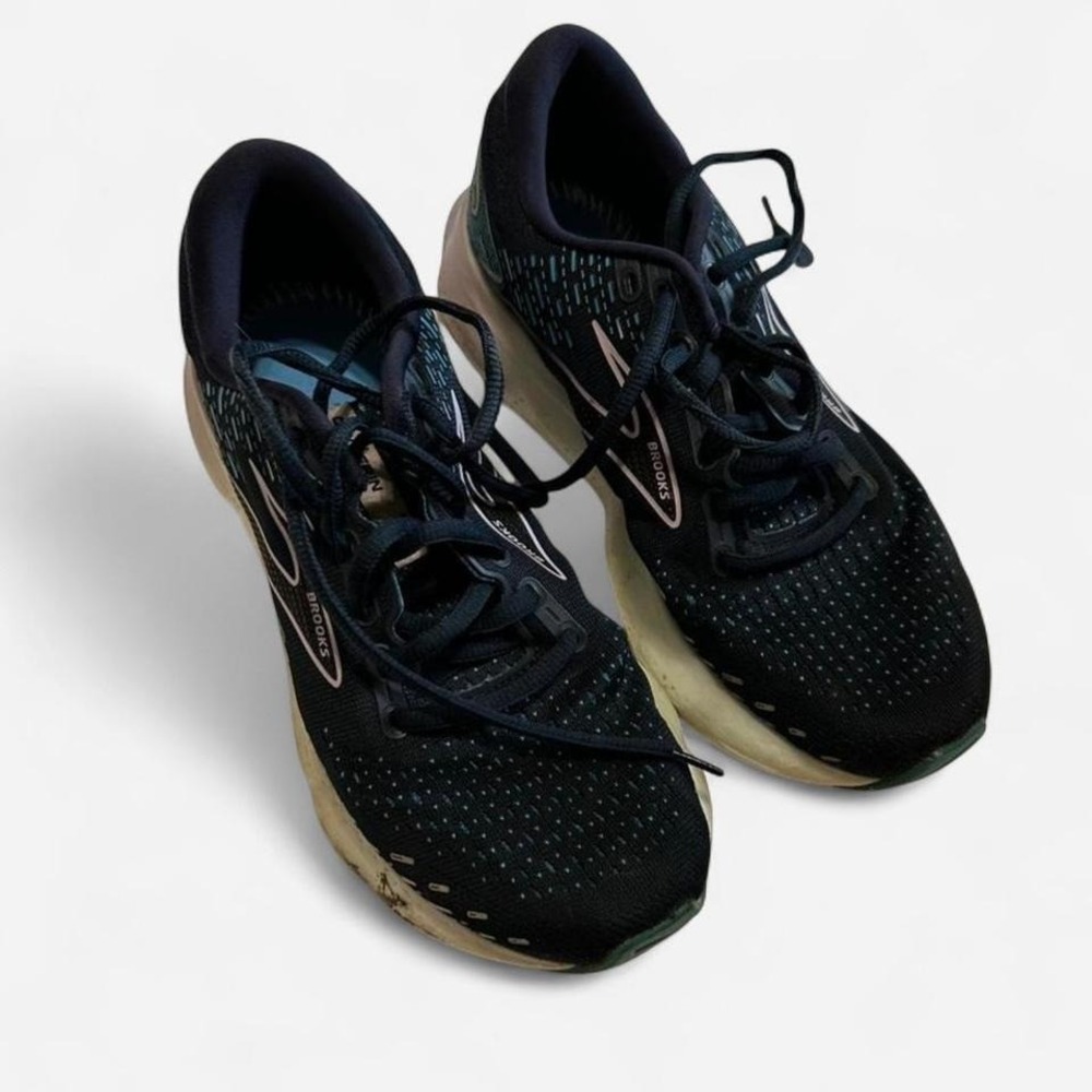 Lightly used Brooks women's running shoes in a hard-to-find Wide (D) fit.